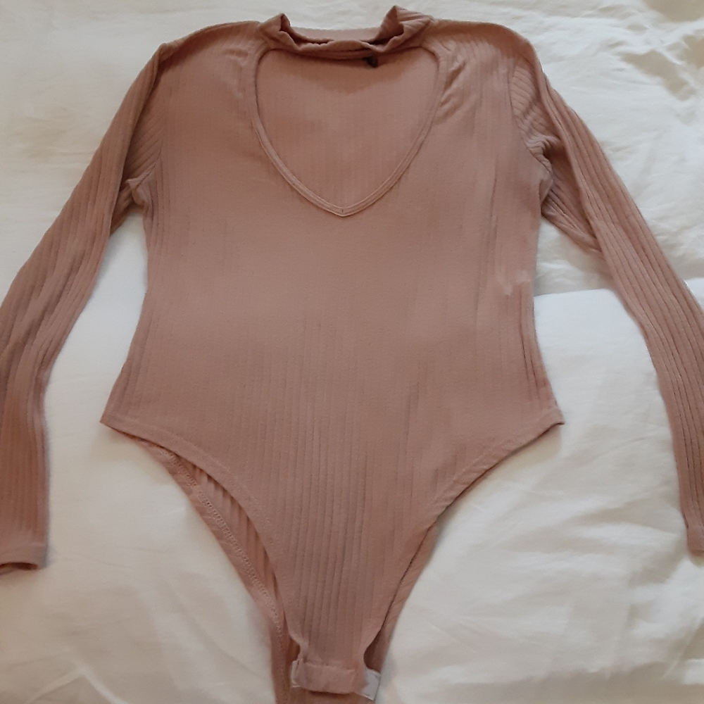 Long sleeve one piece.